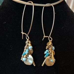 Lovely turquoise and gold dangle hoop earrings with beads. Lightweight.